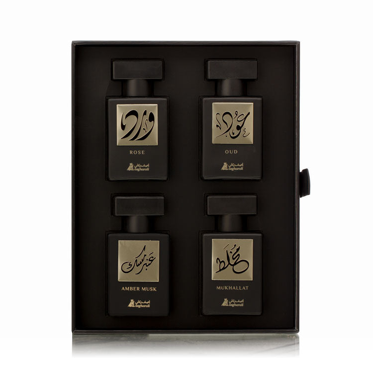 A set of four black perfume bottles with labels in a gift box, representing the Exotic Collection - Mini Series.