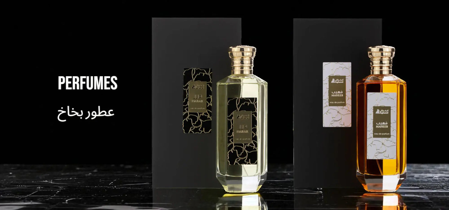 Asgharali Premium Perfumes Banner – luxury floral-patterned perfume bottles with elegant black boxes, promoting the exclusive fragrance collection
