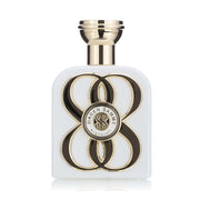Perfume bottle with gold and black design on a white background