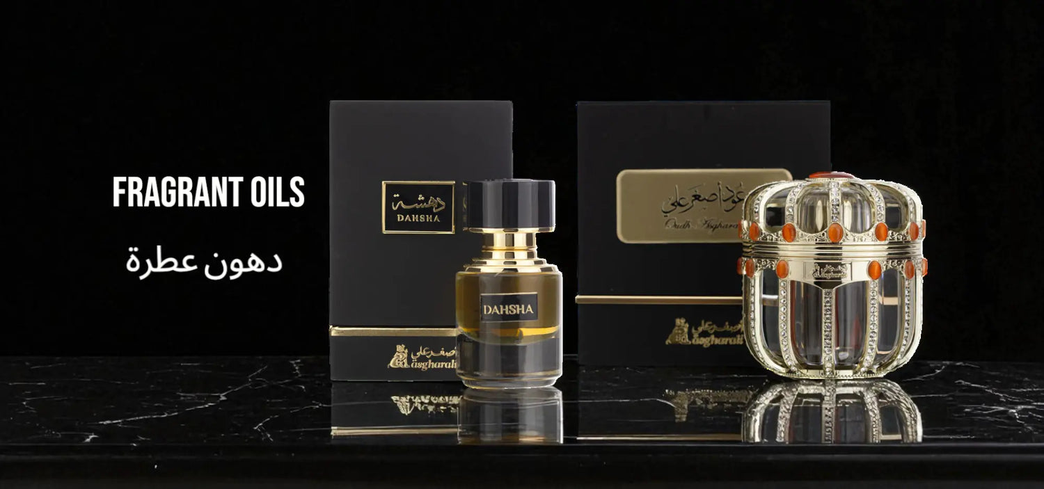 Asgharali Fragrant Oils Banner – premium attar bottles Dahsha and Oud attar with elegant black and gold packaging, representing the luxurious concentrated oil collection